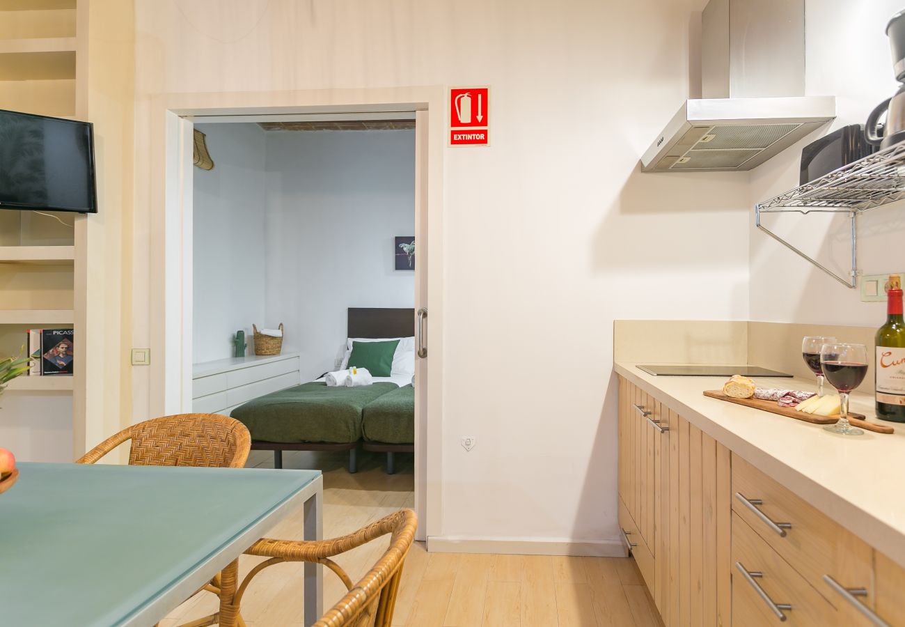 kitchen and dining table of apartment in Barceloneta beach